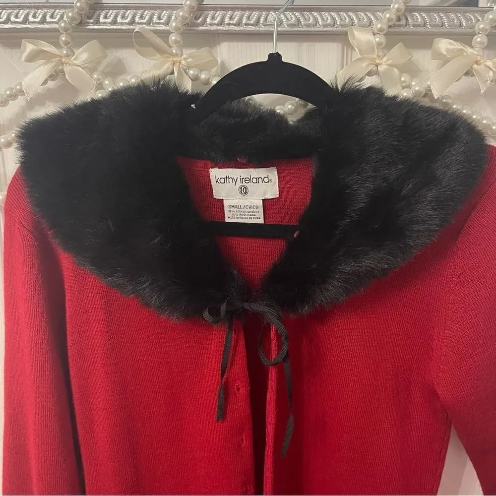 Red button down cardigan with black fur trim
